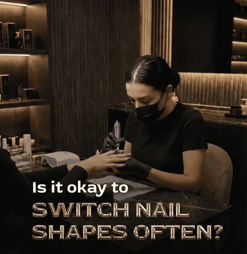 A nail technician shapes a client's nails in a salon.